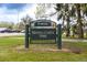 Magna Carta Park entrance sign on a green grassy lawn at 2140 S Ash St # 102, Denver, CO 80222
