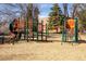 Community playground with climbing structures and slides, perfect for outdoor fun at 2140 S Ash St # 102, Denver, CO 80222