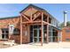 Exterior view of the Eisenhower Recreation Center with covered entrance at 2140 S Ash St # 102, Denver, CO 80222