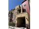 Building exterior featuring a private balcony and covered entryway with unit number 1062 at 1062 Rockhurst Dr # 302, Highlands Ranch, CO 80129