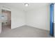 Cozy bedroom with neutral carpet and access to an ensuite bathroom at 7812 W 43Rd Pl, Wheat Ridge, CO 80033