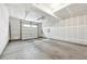 Spacious two car garage with an automatic door that is unfinished and ready to be customized at 7812 W 43Rd Pl, Wheat Ridge, CO 80033