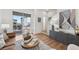 Comfortable living room with a sliding door to the balcony and contemporary decor at 7812 W 43Rd Pl, Wheat Ridge, CO 80033