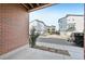 This ground floor patio provides lovely views of the neighborhood and surrounding townhomes at 7812 W 43Rd Pl, Wheat Ridge, CO 80033