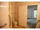 Bathroom features tiled floors, toilet, and shower/tub at 2980 W Centennial Dr # L, Littleton, CO 80123