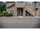 Inviting exterior featuring well-maintained landscaping and an exterior staircase at 2980 W Centennial Dr # L, Littleton, CO 80123