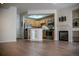 Modern kitchen with stainless steel appliances, granite countertops, and custom wood cabinets at 2980 W Centennial Dr # L, Littleton, CO 80123