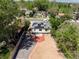 Aerial view of the home showcasing solar panels, fenced yard and driveway at 3636 Ames St, Wheat Ridge, CO 80212