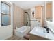 Modern bathroom features a tiled shower, updated fixtures, and plenty of natural light at 720 Lipan St, Denver, CO 80204