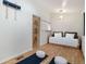 Comfortable zen space with hardwood floors, futon, yoga mats, and Japanese accents at 720 Lipan St, Denver, CO 80204