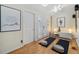 Bright, multi-purpose room with hardwood floors, yoga mats and tranquil decor at 720 Lipan St, Denver, CO 80204