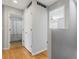 Upstairs hallway leading to a bedroom and bathroom at 1242 Bluebird St, Brighton, CO 80601