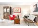 Well-decorated living room with eclectic art and comfortable seating, perfect for relaxing at 6495 E Happy Canyon Rd # 114, Denver, CO 80237