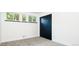 Bedroom featuring three windows and closet with sliding doors, providing ample storage at 7695 Quitman St, Westminster, CO 80030