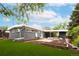 View of home exterior with modern patio and lush landscaping at 7695 Quitman St, Westminster, CO 80030