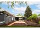 Exterior of home with patio and landscaped backyard at 7695 Quitman St, Westminster, CO 80030