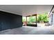 Covered patio with concrete floor and view of landscaped backyard at 7695 Quitman St, Westminster, CO 80030