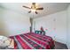 Inviting bedroom showcases a comfortable bed and closet space at 19120 E 54Th Pl, Denver, CO 80249