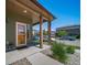Inviting front porch featuring a stylish welcome sign, and ample natural light at 19120 E 54Th Pl, Denver, CO 80249