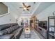 A well-decorated living room flows seamlessly into the kitchen, creating a spacious and modern feel at 19120 E 54Th Pl, Denver, CO 80249