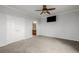 Spacious main bedroom with carpeting, large closets and ensuite bathroom, providing a private retreat at 13456 Via Varra # 401, Broomfield, CO 80020