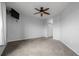Large bedroom with ceiling fan and mounted tv at 13456 Via Varra # 401, Broomfield, CO 80020