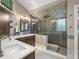 Elegant bathroom with double sinks, large shower, and soaking tub at 1832 W 33Rd Ave, Denver, CO 80211