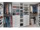 Large walk-in closet with ample shelving and hanging space at 1832 W 33Rd Ave, Denver, CO 80211