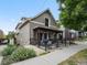 Two-story craftsman home with front porch and well-maintained landscaping at 1832 W 33Rd Ave, Denver, CO 80211