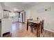 Kitchen with dining area and hardwood floors at 9303 W 66Th Pl, Arvada, CO 80004