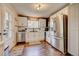 Modern kitchen with stainless steel appliances at 9303 W 66Th Pl, Arvada, CO 80004