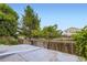 Fenced backyard with mature trees offering privacy at 11120 Josephine Way, Northglenn, CO 80233