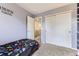 Bright bedroom featuring a large closet and comfortable carpet at 11120 Josephine Way, Northglenn, CO 80233