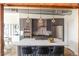Stylish kitchen with a large island, stainless steel appliances, and modern pendant lights at 1720 Wynkoop St # Ph403, Denver, CO 80202