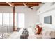 Bright main bedroom featuring a tray ceiling, ceiling fan, and large windows at 1720 Wynkoop St # Ph403, Denver, CO 80202