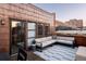 Inviting rooftop deck with comfortable seating and views of the surrounding city at 1720 Wynkoop St # Ph403, Denver, CO 80202