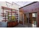Charming rooftop deck with wooden accents, string lights, and lush greenery, creates a cozy and inviting outdoor space at 1720 Wynkoop St # Ph403, Denver, CO 80202