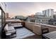 City views from the rooftop deck featuring modern seating and outdoor space at 1720 Wynkoop St # Ph403, Denver, CO 80202