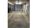 Secured storage unit with concrete floor, cage door, and numbered space offers practicality for storing belongings at 1720 Wynkoop St # Ph403, Denver, CO 80202