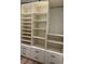Well-organized walk-in closet with ample shelving and drawer space at 1720 Wynkoop St # Ph403, Denver, CO 80202