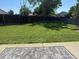 Spacious backyard featuring a well-maintained lawn and a privacy fence, perfect for outdoor activities at 12528 Ash St, Thornton, CO 80241