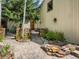 Beautiful home exterior with a flagstone pathway and mature landscaping at 2012 Tournament Ct, Evergreen, CO 80439