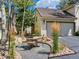 Inviting home exterior with a private front patio and well maintained landscaping at 2012 Tournament Ct, Evergreen, CO 80439
