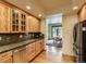 Kitchen featuring wood cabinets, granite counters and stainless steel appliances at 2012 Tournament Ct, Evergreen, CO 80439
