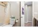 Bathroom features a shower with tub, toilet, and a neutral color scheme, offering essential amenities at 7862 W Euclid Pl, Littleton, CO 80123