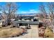 Two-story house with a large yard and mountain views at 7913 Grasmere Dr, Boulder, CO 80301