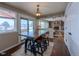 Charming dining area with rustic wood table and access to backyard at 7913 Grasmere Dr, Boulder, CO 80301