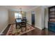 Dining room with hardwood floors, table and chairs, and chandelier at 7913 Grasmere Dr, Boulder, CO 80301