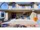 Brick front porch with seating, creating a welcoming entrance at 7913 Grasmere Dr, Boulder, CO 80301