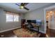 Home office with hardwood floors, desk, and two monitors at 7913 Grasmere Dr, Boulder, CO 80301